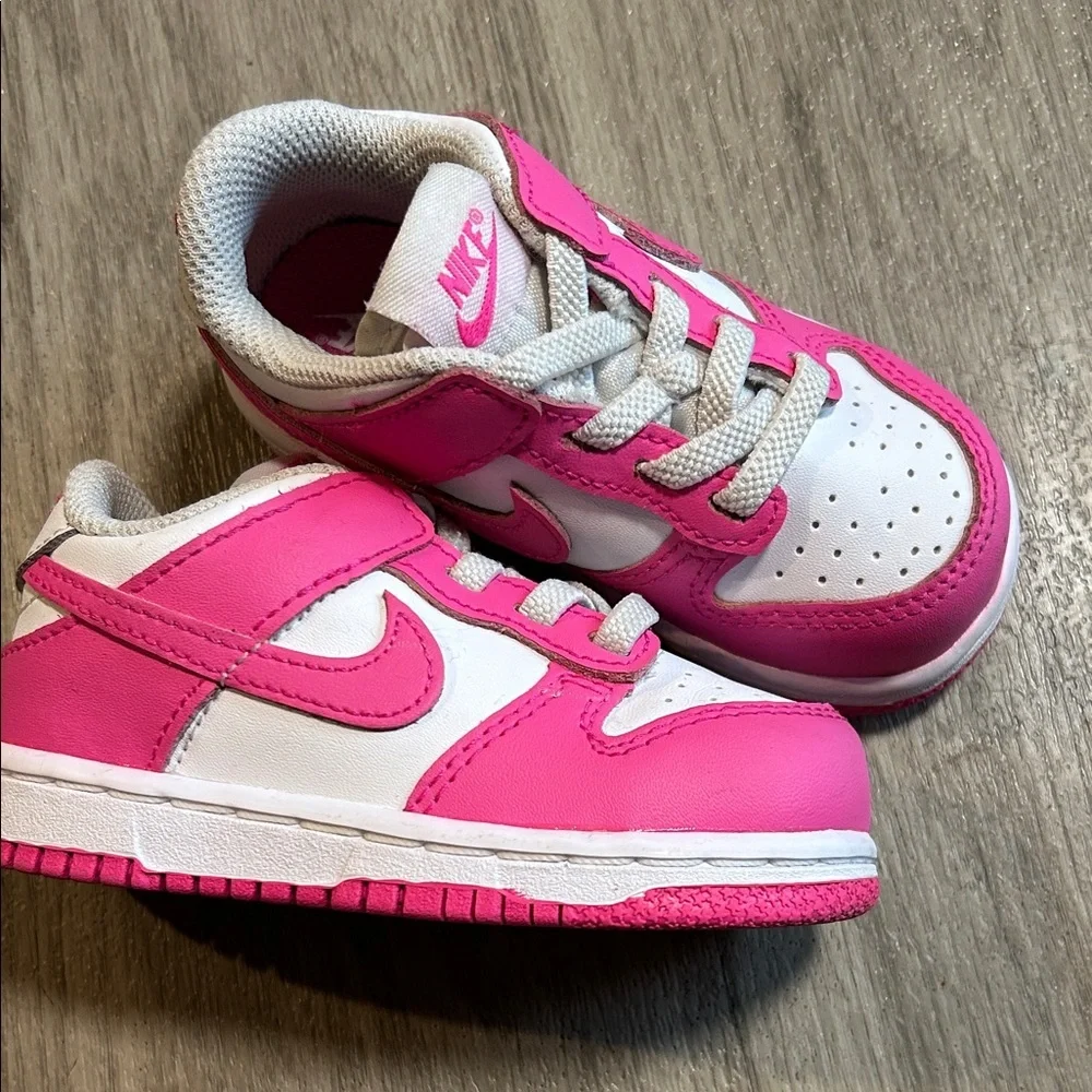 Nike Kids White and Hot Pink Low-Top Sneakers.